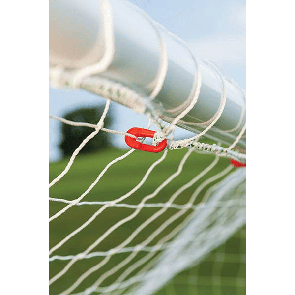 HART Samba Match Goals – red clip securing white net to white goalpost corner on green grass field.