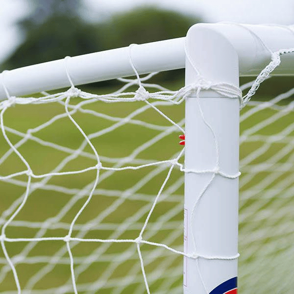HART Samba Match Goals – white goalpost corner with taut white net secured by string on green grass field.