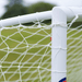 HART Samba Match Goals – white goalpost corner with taut white net secured by string on green grass field.