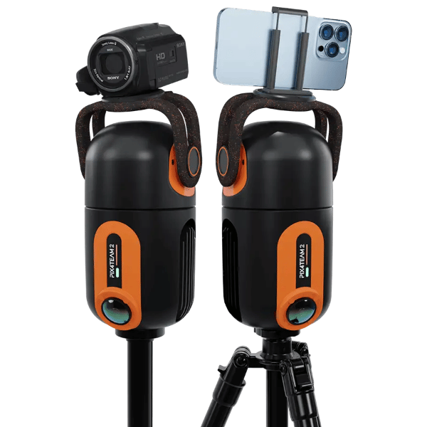 Two Pix4Team with a camera and phone on a white background