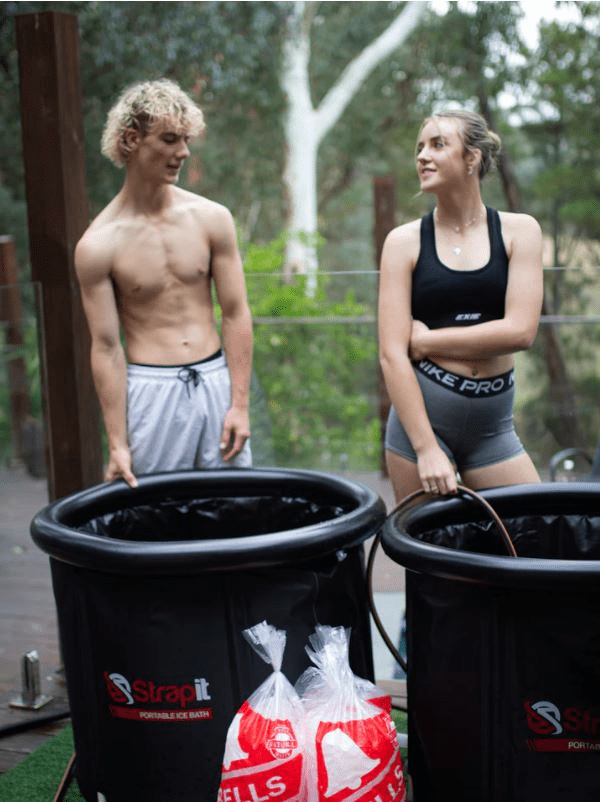 Strapit Portable Ice Bath guy and girl filling up ice baths with water