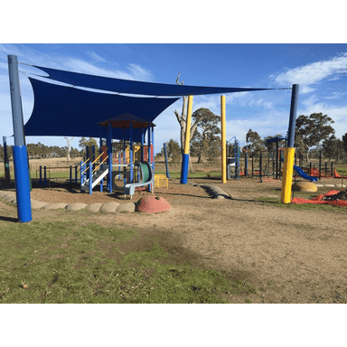 Playground with yellow and blue padded posts